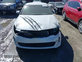 2016 Kia Optima LX with VIN KNAGT4L39G5073865, listed as a IAAI auction lot 41675211 with 120,751 mi miles. Bid and sale history available at carsss.com. Image 12.