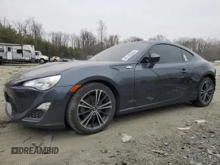 2016 Scion FR-S z VIN JF1ZNAA1XG8703502, wystawiony jako Copart lot #48143585 z przebiegiem 91 127 mil mil oraz Szkoda całkowita • Salvage title. Historia ofert i sprzedaży dostępna na DreamBid. Obrazek 1.