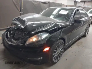 2014 Mercedes-Benz C 250 Sport with VIN WDDGF4HB9EA954859, listed as a IAAI auction lot 42027885 with 64,223 mi miles and . Bid and sale history available at carsss.com. Image 2.