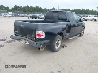 2000 Ford F-150 XL with VIN 1FTRX07W9YKB27455, listed as a IAAI auction lot 42197973 with 211,160 mi miles and . Bid and sale history available at DreamBid. Image 4.