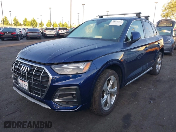 2021 Audi Q5 Premium Plus with VIN WA1BAAFY5M2015445, listed as a IAAI auction lot 42648905 with 41,312 mi miles and . Bid and sale history available at DreamBid. Image 2.