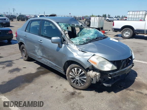 2009 Nissan Versa 1.8 S with VIN 3N1BC11E09L449780, listed as a IAAI auction lot 42034977 with 180,680 mi miles. Bid and sale history available at carsss.com. Image 1.