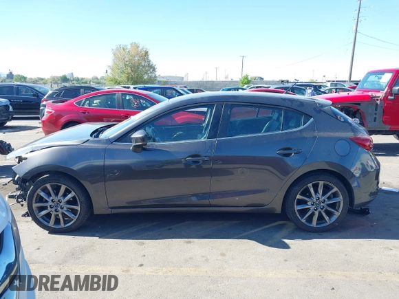 2018 Mazda 3 Touring with VIN 3MZBN1L34JM164952, listed as a IAAI auction lot 42179420 with 106,706 mi miles and . Bid and sale history available at DreamBid. Image 14.