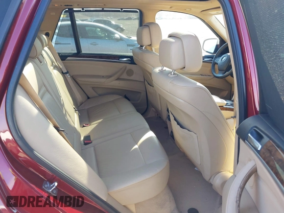 2011 BMW X5 35i with VIN 5UXZV4C52BL413125, listed as a IAAI auction lot 41697824 with 136,828 mi miles. Bid and sale history available at carsss.com. Image 8.