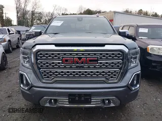 2020 GMC Sierra 1500 Denali z VIN 3GTU9FED1LG164752, wystawiony jako IAAI lot #41530535 z przebiegiem 119 037 mil mil oraz . Historia ofert i sprzedaży dostępna na DreamBid. Obrazek 12.