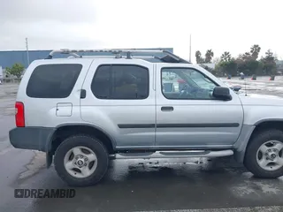 2001 Nissan Xterra XE z VIN 5N1ED28Y71C575157, wystawiony jako IAAI lot #41806229 z przebiegiem 126 091 mil mil oraz . Historia ofert i sprzedaży dostępna na DreamBid. Obrazek 14.