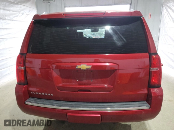 2015 Chevrolet Suburban LTZ with VIN 1GNSKKKC7FR299567, listed as a Copart auction lot 52944035 with 147,964 mi miles and Salvage Title. Bid and sale history available at DreamBid. Image 6.