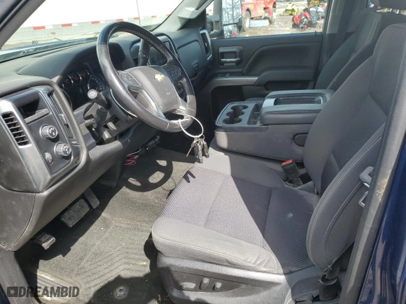 2018 Chevrolet Silverado 1500 LT with VIN 1GCVKREC7JZ162065, listed as a Copart auction lot 52033975 with 98,939 mi miles and Salvage Title. Bid and sale history available at carsss.com. Image 7.