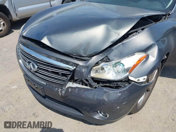 2012 Infiniti M with VIN JN1BY1AR3CM390550, listed as a IAAI auction lot 42797466 with 177,338 mi miles and . Bid and sale history available at DreamBid. Image 6.