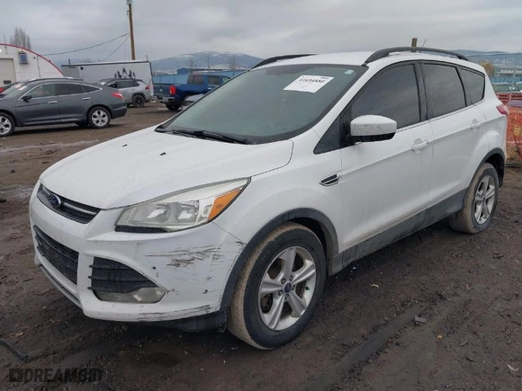 2015 Ford Escape SE with VIN 1FMCU9GX8FUC80918, listed as a IAAI auction lot 41694880 with 182,929 mi miles. Bid and sale history available at carsss.com. Image 2.