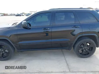2018 Jeep Grand Cherokee Altitude with VIN 1C4RJFAG9JC436848, listed as a IAAI auction lot 42303459 with 124,044 mi miles and . Bid and sale history available at DreamBid. Image 14.