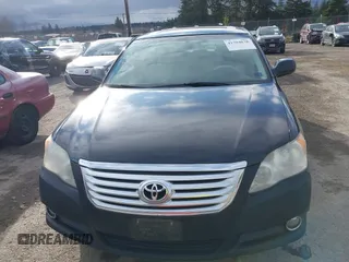 2010 Toyota Avalon XL with VIN 4T1BK3DB1AU356186, listed as a IAAI auction lot 41704838 with 150,462 mi miles and . Bid and sale history available at carsss.com. Image 13.