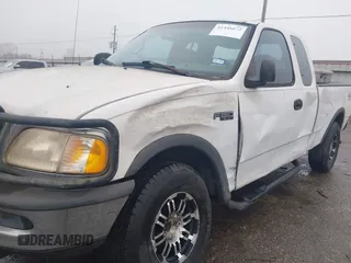 1997 Ford F-150 XL with VIN 1FTDX1863VNB01474, listed as a IAAI auction lot 41446672 with 223,296 mi miles. Bid and sale history available at carsss.com. Image 6.