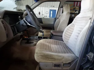 1995 Jeep Grand Cherokee Laredo with VIN 1J4GZ58Y5SC565187, listed as a Copart auction lot 45179985 with 122,863 mi miles and Salvage Title. Bid and sale history available at carsss.com. Image 7.