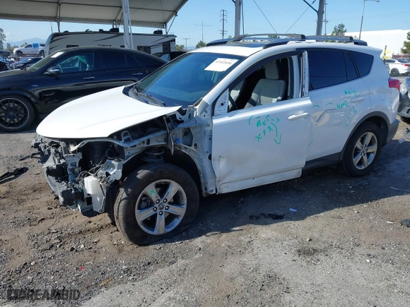 2015 Toyota RAV4 XLE with VIN JTMWFREV9FJ034992, listed as a IAAI auction lot 41922694 with 100,956 mi miles. Bid and sale history available at carsss.com. Image 18.