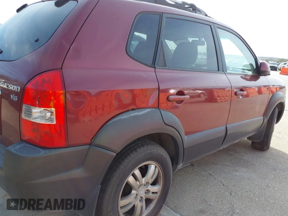 2006 Hyundai Tucson GLS with VIN KM8JN12D16U453097, listed as a IAAI auction lot 41819035 with 237,312 mi miles. Bid and sale history available at carsss.com. Image 6.