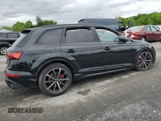 2023 Audi SQ7 Prestige z VIN WA1VWBF74PD004778, wystawiony jako Copart lot #55252164 z przebiegiem Nie podano mil oraz . Historia ofert i sprzedaży dostępna na DreamBid. Obrazek 3.
