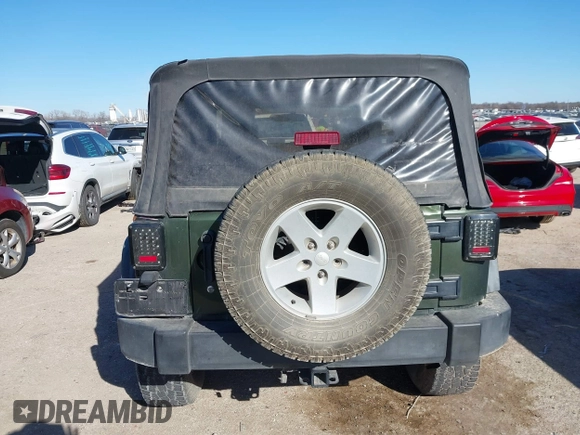 2007 Jeep Wrangler X with VIN 1J8FA24197L205095, listed as a IAAI auction lot 41388452 with 127,051 mi miles and . Bid and sale history available at carsss.com. Image 16.