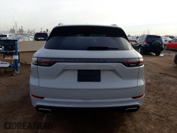 2020 Porsche Cayenne z VIN WP1AA2AY1LDA10064, wystawiony jako Copart lot #73385652 z przebiegiem 14 048 mil mil oraz . Historia ofert i sprzedaży dostępna na DreamBid. Obrazek 6.