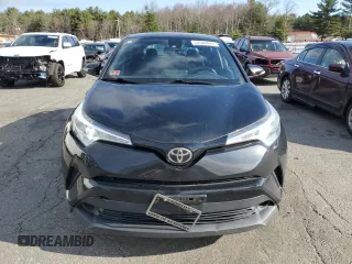 2018 Toyota C-HR XLE z VIN NMTKHMBX5JR016663, wystawiony jako Copart lot #52088425 z przebiegiem 106 566 mil mil oraz Szkody całkowita. Historia ofert i sprzedaży dostępna na DreamBid. Obrazek 5.