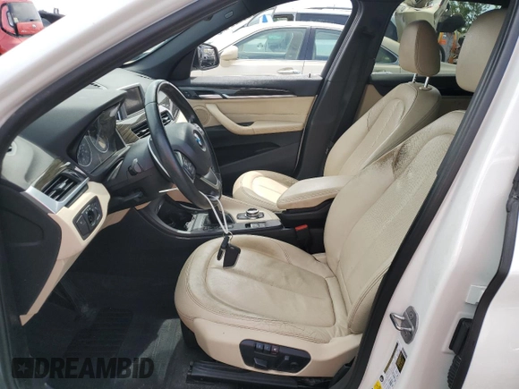 2017 BMW X1 xDrive28i with VIN WBXHT3Z37H4A55614, listed as a Copart auction lot 63491415 with 120,680 mi miles and Salvage title. Bid and sale history available at DreamBid. Image 7.