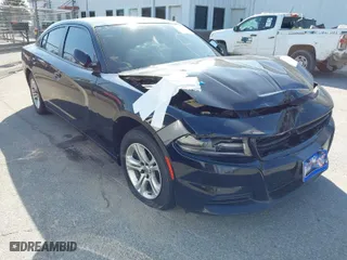 2019 Dodge Charger SXT with VIN 2C3CDXBG3KH695713, listed as a IAAI auction lot 41862535 with 120,974 mi miles. Bid and sale history available at carsss.com. Image 1.