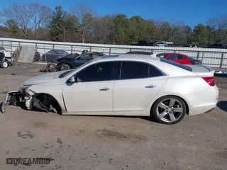 2014 Chevrolet Malibu LTZ with VIN 1G11J5SX7EF204252, listed as a IAAI auction lot 41439734 with 193,123 mi miles. Bid and sale history available at carsss.com. Image 14.
