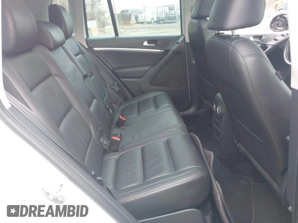 2012 Volkswagen Tiguan S with VIN WVGBV7AX0CW543697, listed as a IAAI auction lot 41853077 with 113,002 mi miles and . Bid and sale history available at DreamBid. Image 8.