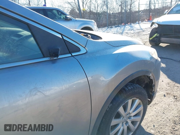 2010 Mazda CX-9 Grand Touring z VIN JM3TB3MA7A0222135, wystawiony jako IAAI lot #41321999 z przebiegiem Nie podano mil oraz . Historia ofert i sprzedaży dostępna na DreamBid. Obrazek 11.