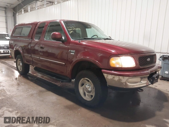 1998 Ford F-150 with VIN 1FTZX18W8WKA19037, listed as a IAAI auction lot 40977819 with 137,119 mi miles and . Bid and sale history available at DreamBid. Image 1.