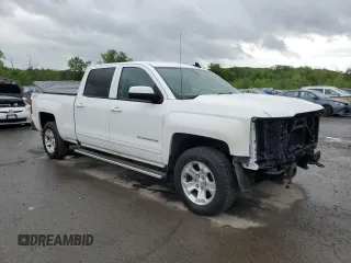 2016 Chevrolet Silverado 1500 LT with VIN 3GCUKREC1GG341223, listed as a Copart auction lot 56547195 with 180,189 mi miles and Salvage Title. Bid and sale history available at DreamBid. Image 4.