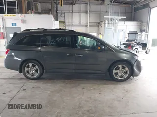 2011 Honda Odyssey Touring с VIN 5FNRL5H90BB025855, выставлен на аукционе IAAI как лот 42104979 с пробегом 165 010 миль миль и . История ставок и продаж доступна на DreamBid. Изображение 14.