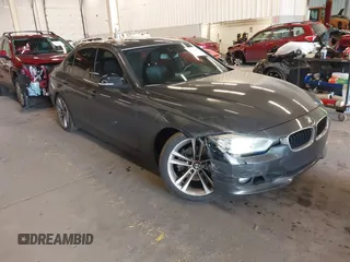2014 BMW 3 Series 328i with VIN WBA3A5G57ENP31847, listed as a IAAI auction lot 41719053 with 163,211 mi miles. Bid and sale history available at carsss.com. Image 1.