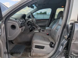 2004 Porsche Cayenne S z VIN WP1AB29P04LA72930, wystawiony jako Copart lot #56658615 z przebiegiem 143 527 mil mil oraz Szkoda całkowita • Salvage title. Historia ofert i sprzedaży dostępna na DreamBid. Obrazek 7.