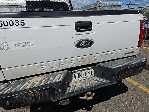 2016 Ford Super Duty F-250 SRW XLT with VIN 1FT7X2B6XGEB63047, listed as a IAAI auction lot 42141698 with 203,235 mi miles. Bid and sale history available at carsss.com. Image 1.