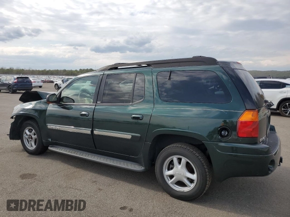 2003 GMC Envoy SLT z VIN 1GKET16P936191818, wystawiony jako Copart lot #53270645 z przebiegiem 130 357 mil mil oraz Szkody całkowita. Historia ofert i sprzedaży dostępna na DreamBid. Obrazek 2.