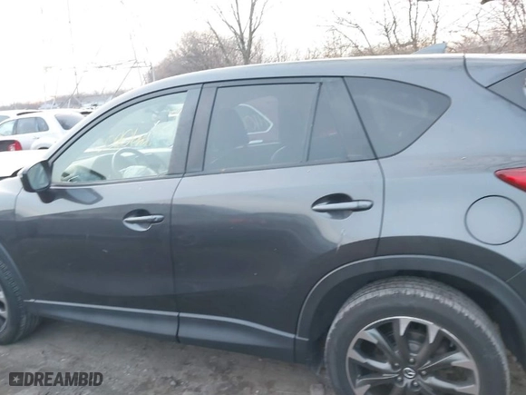 2016 Mazda CX-5 Grand Touring with VIN JM3KE4DYXG0684638, listed as a IAAI auction lot 41101563 with NaN miles. Bid and sale history available at carsss.com. Image 14.