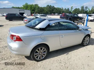 2011 Volkswagen Eos Komfort с VIN WVWBW7AH2BV002794, выставлен на аукционе Copart как лот 56678075 с пробегом 109 736 миль миль и Списание • Salvage title. История ставок и продаж доступна на DreamBid. Изображение 3.