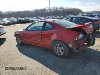 2004 Pontiac Grand Am GT with VIN 1G2NW12E44C112537, listed as a Copart auction lot 87092304 with 180,732 mi miles and Salvage Title. Bid and sale history available at carsss.com. Image 2.