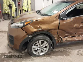 2018 Kia Sportage LX with VIN KNDPM3AC2J7381114, listed as a IAAI auction lot 41214824 with 82,178 mi miles and . Bid and sale history available at carsss.com. Image 6.