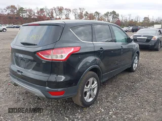 2015 Ford Escape SE with VIN 1FMCU0GXXFUA40927, listed as a IAAI auction lot 40735395 with Not Provided miles. Bid and sale history available at carsss.com. Image 4.