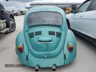 1969 Volkswagen Beetle with VIN 119682637V, listed as a Copart auction lot 70315404 with 59,148 mi miles and Salvage Title. Bid and sale history available at DreamBid. Image 6.