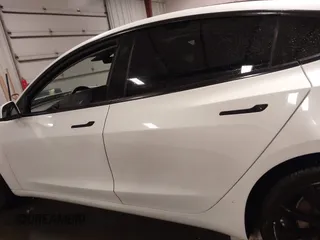 2018 Tesla Model 3 Long Range Battery with VIN 5YJ3E1EA8JF154738, listed as a IAAI auction lot 41013807 with 115,488 mi miles and . Bid and sale history available at DreamBid. Image 15.