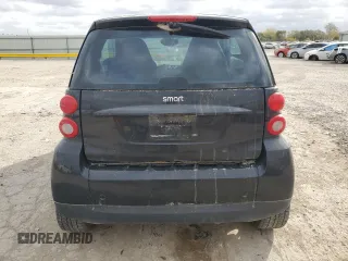2009 Smart fortwo Pure with VIN WMEEJ31X19K267800, listed as a Copart auction lot 77392744 with 100,178 mi miles and Salvage Title. Bid and sale history available at carsss.com. Image 6.