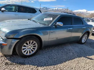 2005 Chrysler 300 with VIN 2C3AA63H35H659798, listed as a Copart auction lot 50322065 with 153,944 mi miles and Salvage Title. Bid and sale history available at carsss.com. Image 1.