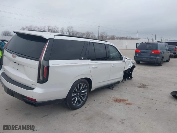 2023 Cadillac Escalade Sport Platinum with VIN 1GYS3GKL1PR197390, listed as a IAAI auction lot 41590503 with 14,711 mi miles. Bid and sale history available at carsss.com. Image 4.