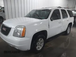 2007 GMC Yukon SLT with VIN 1GKFK130X7R203221, listed as a IAAI auction lot 41583409 with 254,586 mi miles. Bid and sale history available at carsss.com. Image 2.