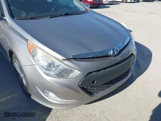 2013 Hyundai Sonata Hybrid Limited with VIN KMHEC4A49DA100762, listed as a IAAI auction lot 41671202 with 209,708 mi miles. Bid and sale history available at carsss.com. Image 6.