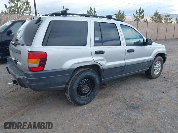 2004 Jeep Grand Cherokee Laredo with VIN 1J4GW48N14C434351, listed as a IAAI auction lot 41860077 with 152,404 mi miles and . Bid and sale history available at DreamBid. Image 4.