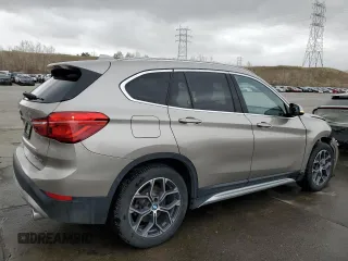 2022 BMW X1 xDrive28i with VIN WBXJG9C0XN5V03922, listed as a Copart auction lot 51248095 with 52,282 mi miles and Salvage Title. Bid and sale history available at carsss.com. Image 3.